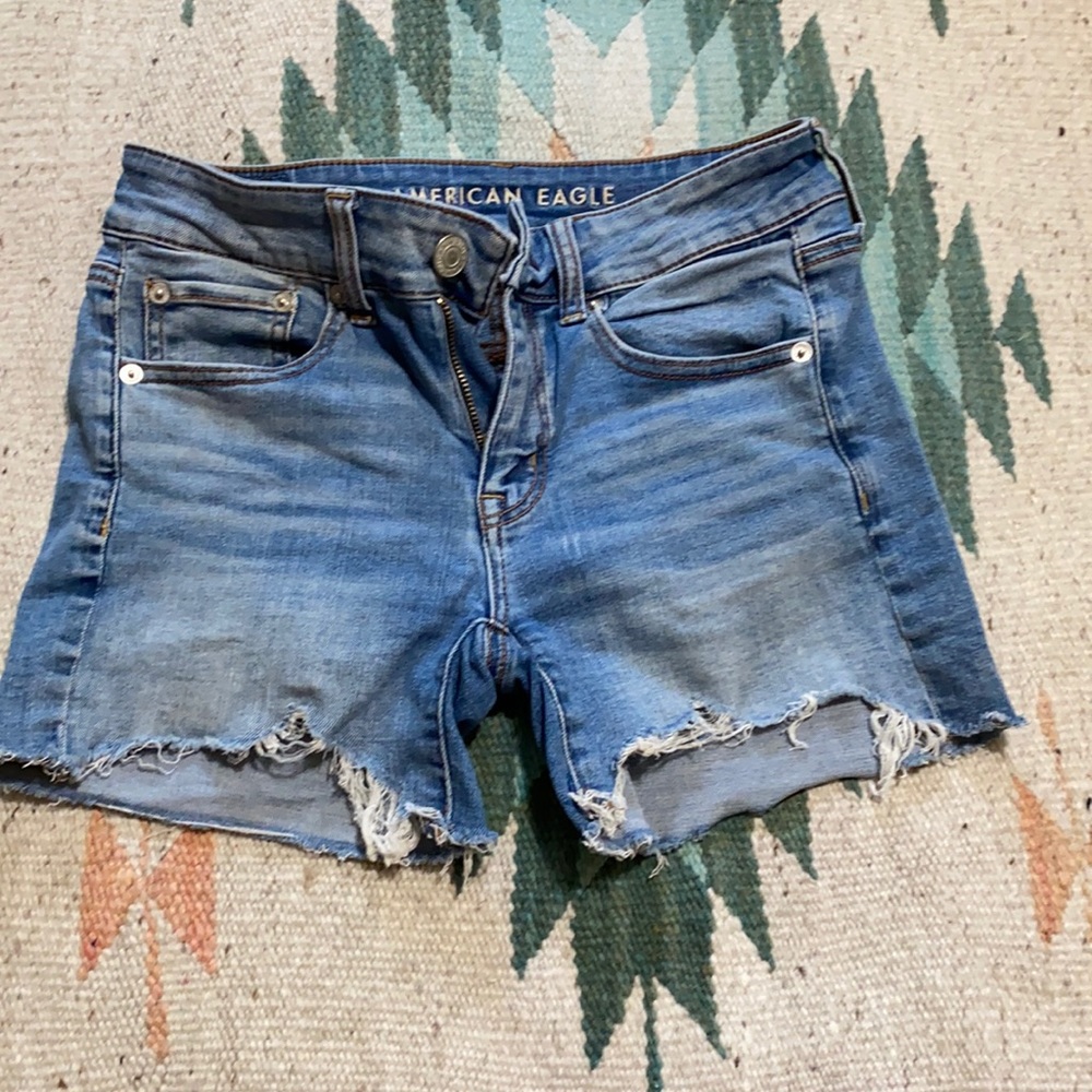 guc American Eagle midi denim distressed shorts
